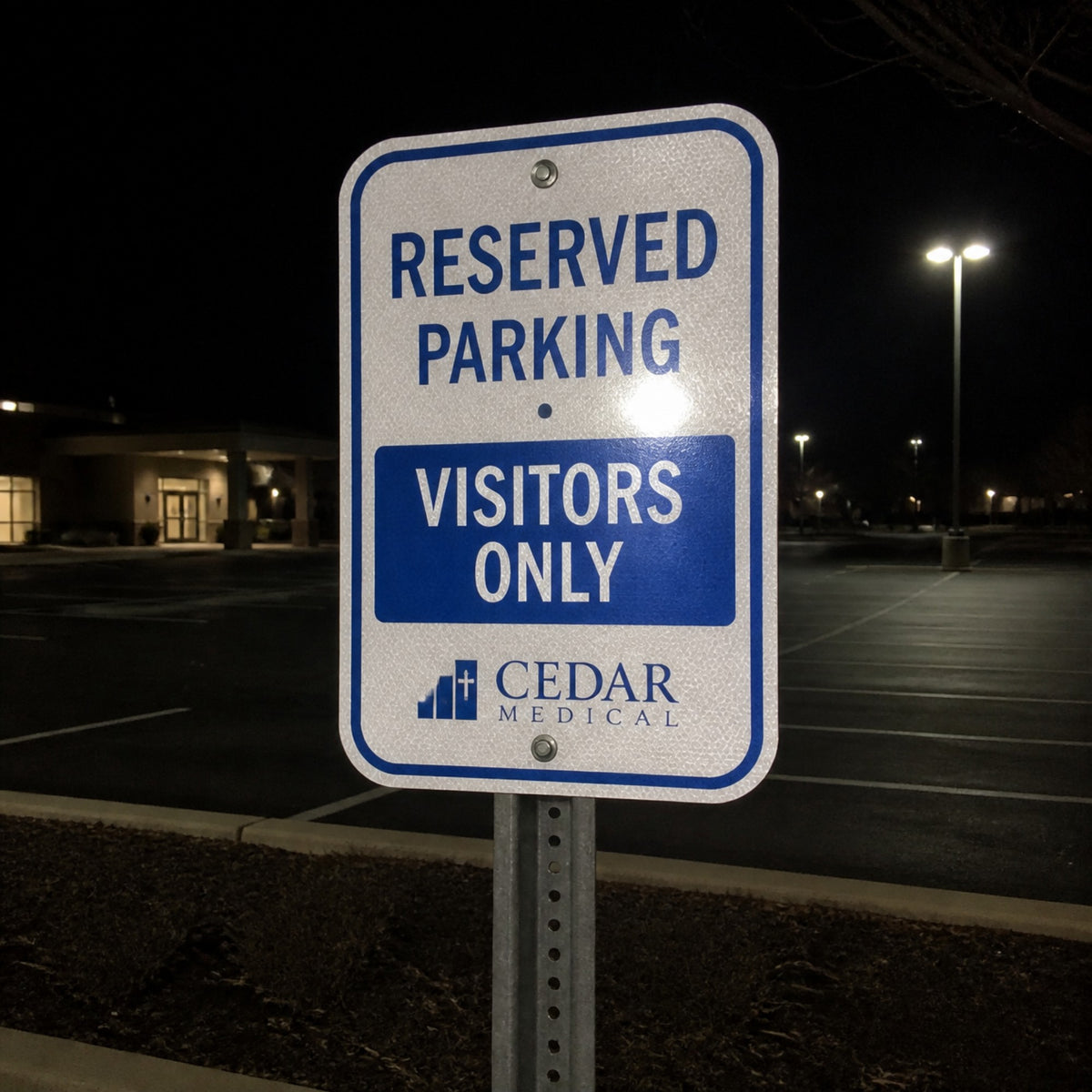 Reflective aluminum parking sign at night