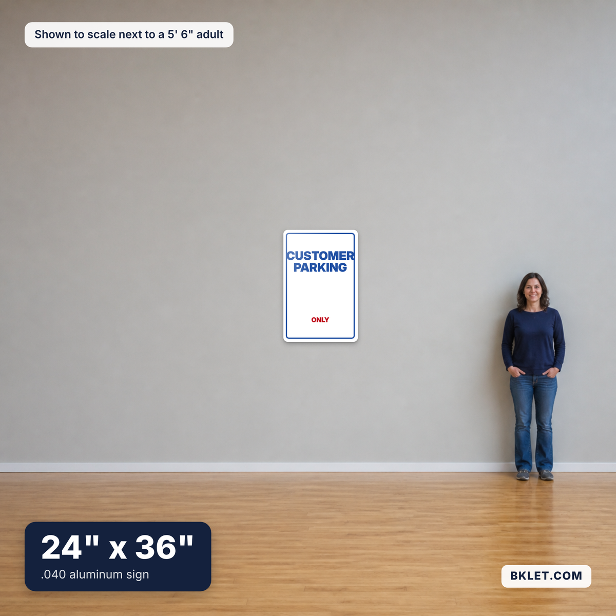 Aluminum sign, 24" x 36", shown to scale next to an adult