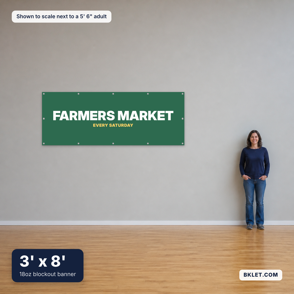 18oz blockout banner, 3' x 8', shown to scale next to an adult