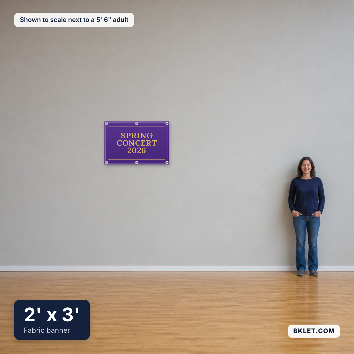 Fabric banner, 2' x 3', shown to scale next to an adult