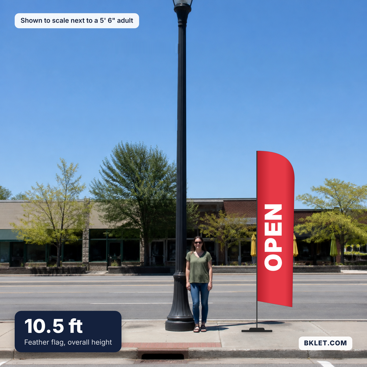 Feather flag, 10.5 ft overall, shown to scale next to an adult