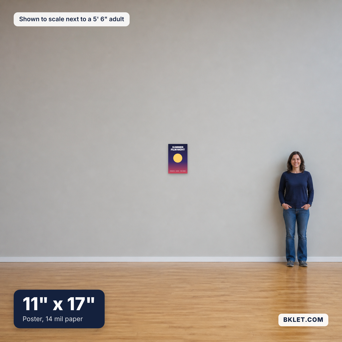 Poster, paper, 11" x 17", shown to scale next to an adult