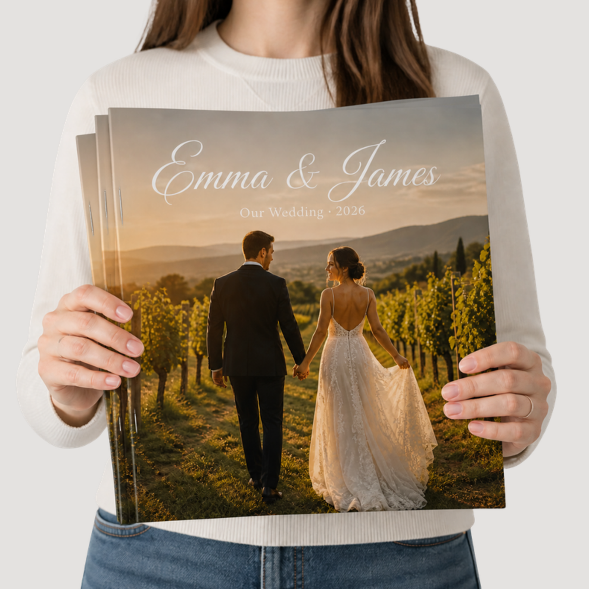 12 x 12 saddle-stitched all-cardstock booklet held in hand