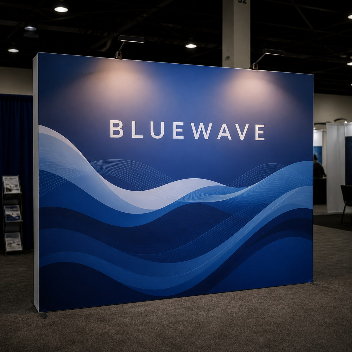 Two LED lights shining on a tension fabric trade show display