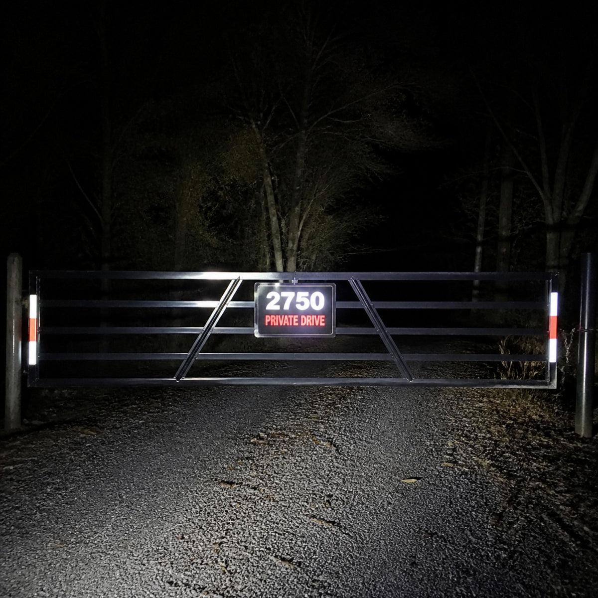 Reflective decal on a gate at night