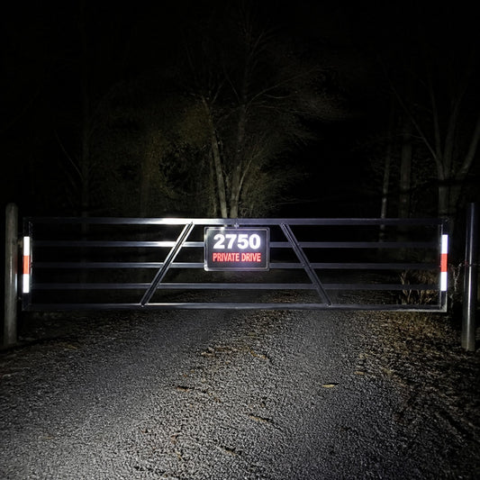 Reflective decal on a gate at night