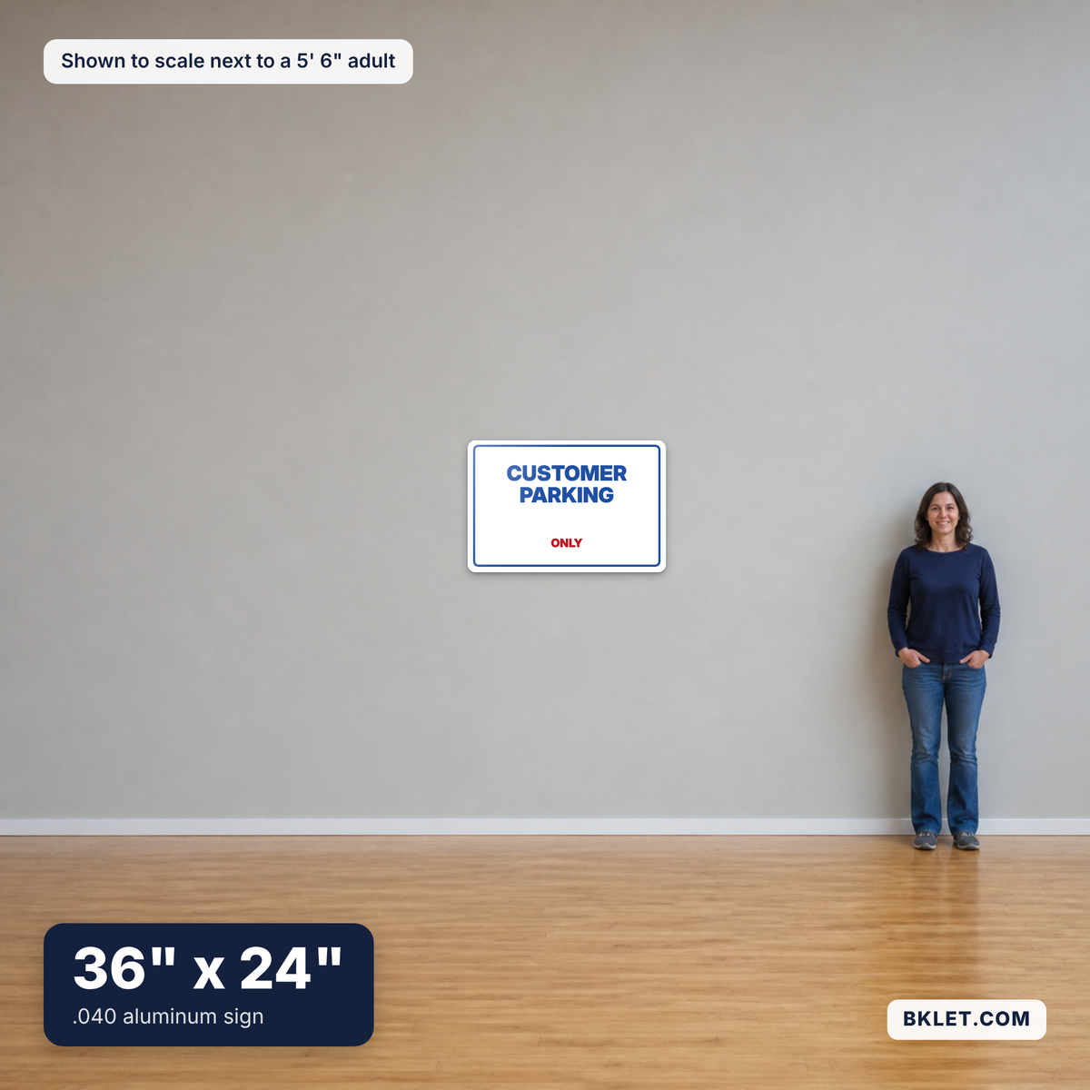 Aluminum sign, 36" x 24", shown to scale next to an adult