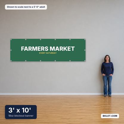 18oz blockout banner, 3' x 10', shown to scale next to an adult