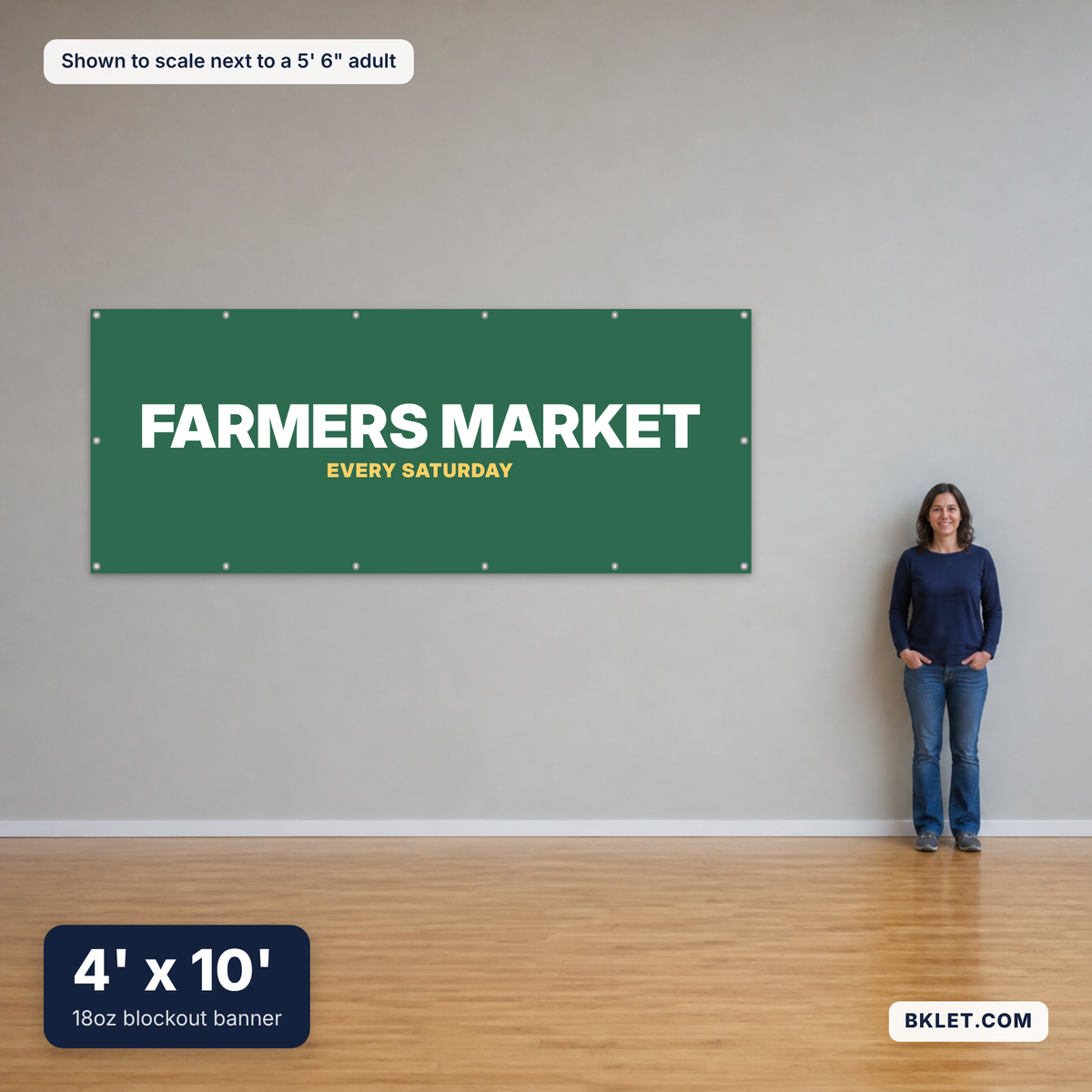 18oz blockout banner, 4' x 10', shown to scale next to an adult