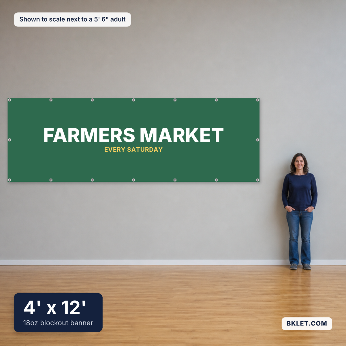 18oz blockout banner, 4' x 12', shown to scale next to an adult