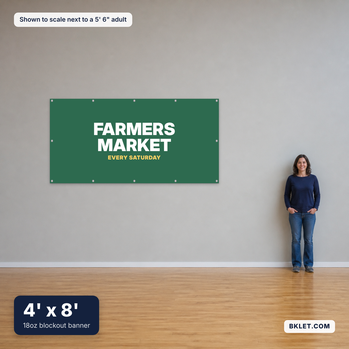 18oz blockout banner, 4' x 8', shown to scale next to an adult