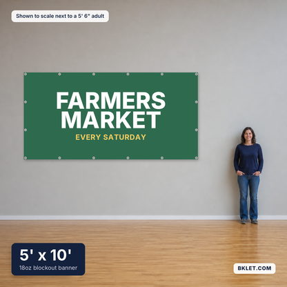 18oz blockout banner, 5' x 10', shown to scale next to an adult