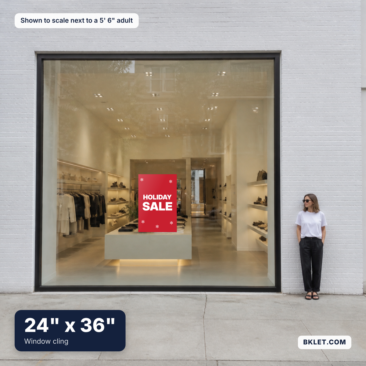 Window cling, 24" x 36", shown to scale next to an adult