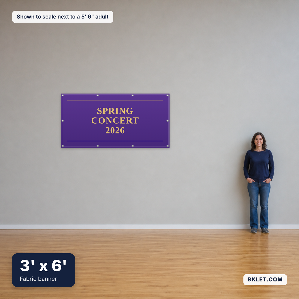 Fabric banner, 3' x 6', shown to scale next to an adult