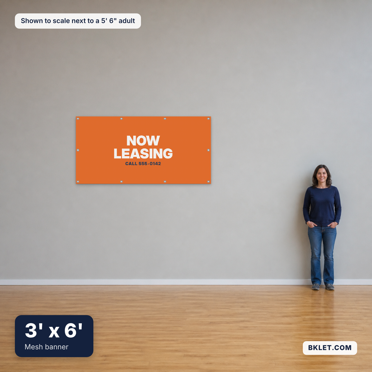 Mesh banner, 3' x 6', shown to scale next to an adult