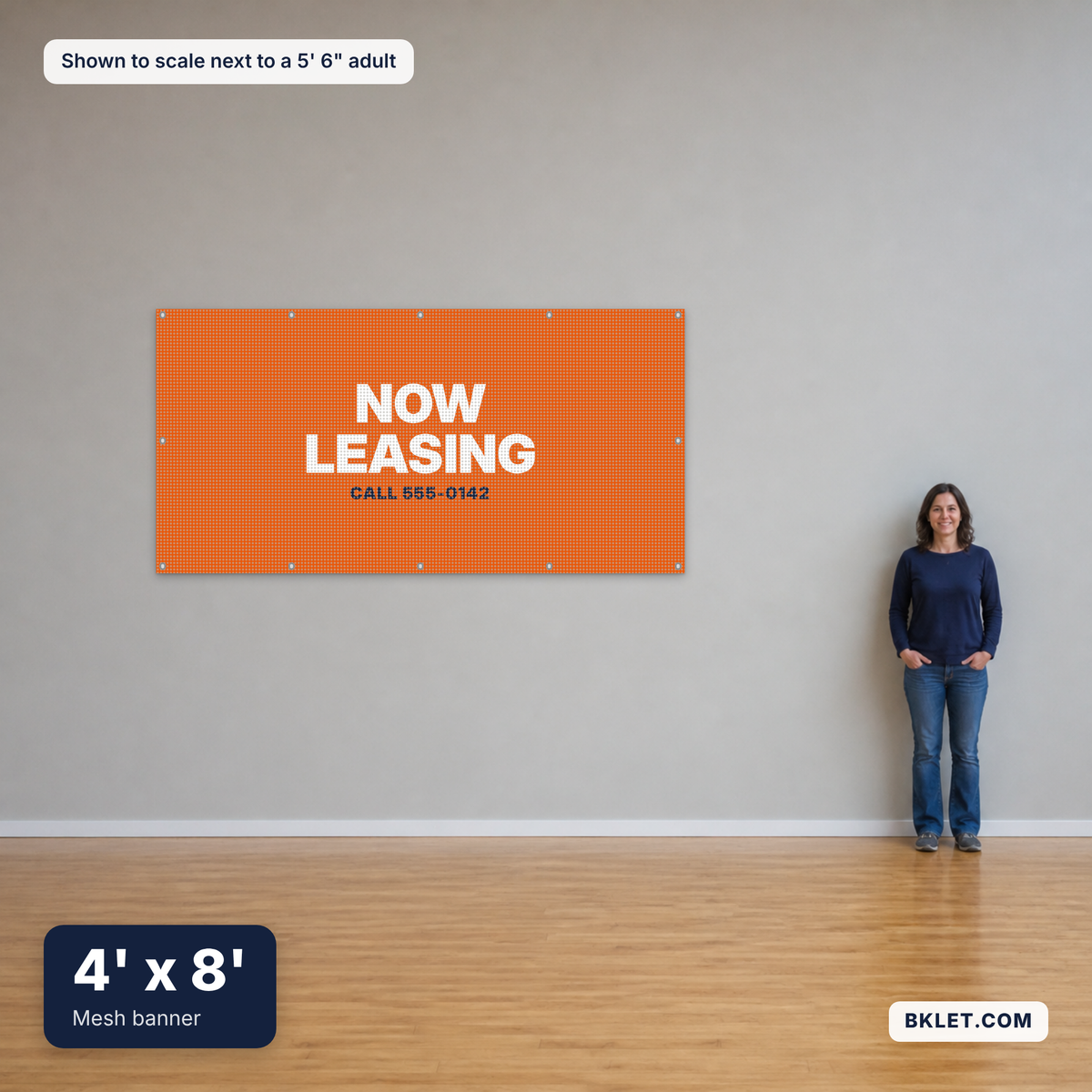 Mesh banner, 4' x 8', shown to scale next to an adult