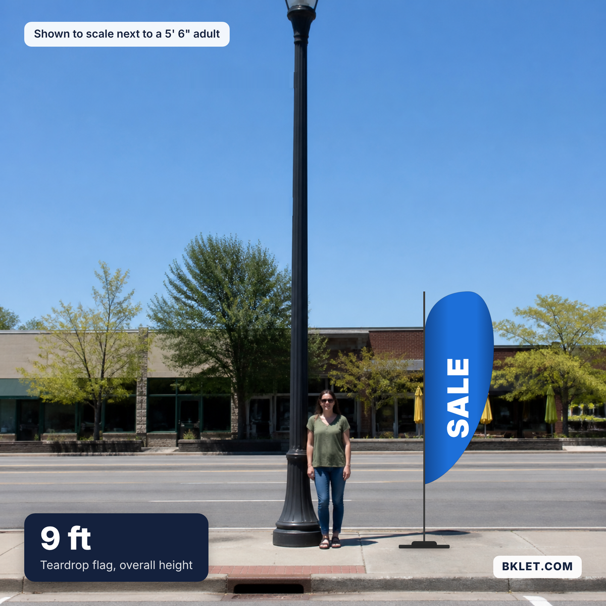 Teardrop flag, 9 ft overall, shown to scale next to an adult