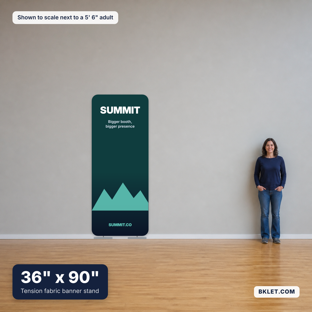 Tension fabric banner stand, 36" x 90", shown to scale next to an adult