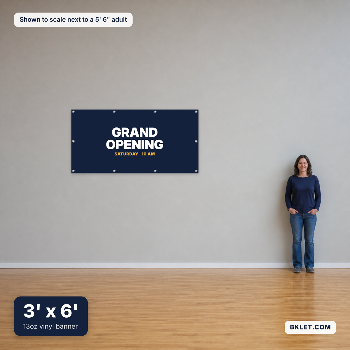 13oz vinyl banner, 3' x 6', shown to scale next to an adult