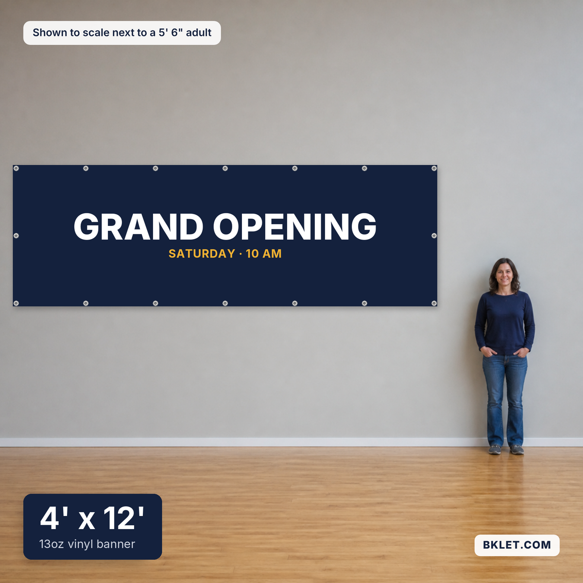 13oz vinyl banner, 4' x 12', shown to scale next to an adult