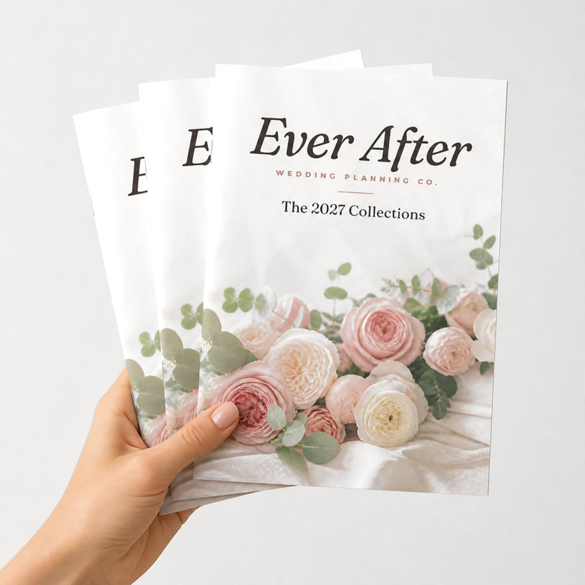 Custom 5 x 7 saddle-stitched booklets held in hand
