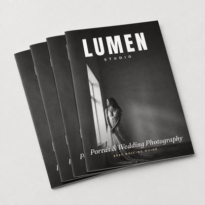 Stack of saddle-stitched 8 x 10 booklets showing the wire staples