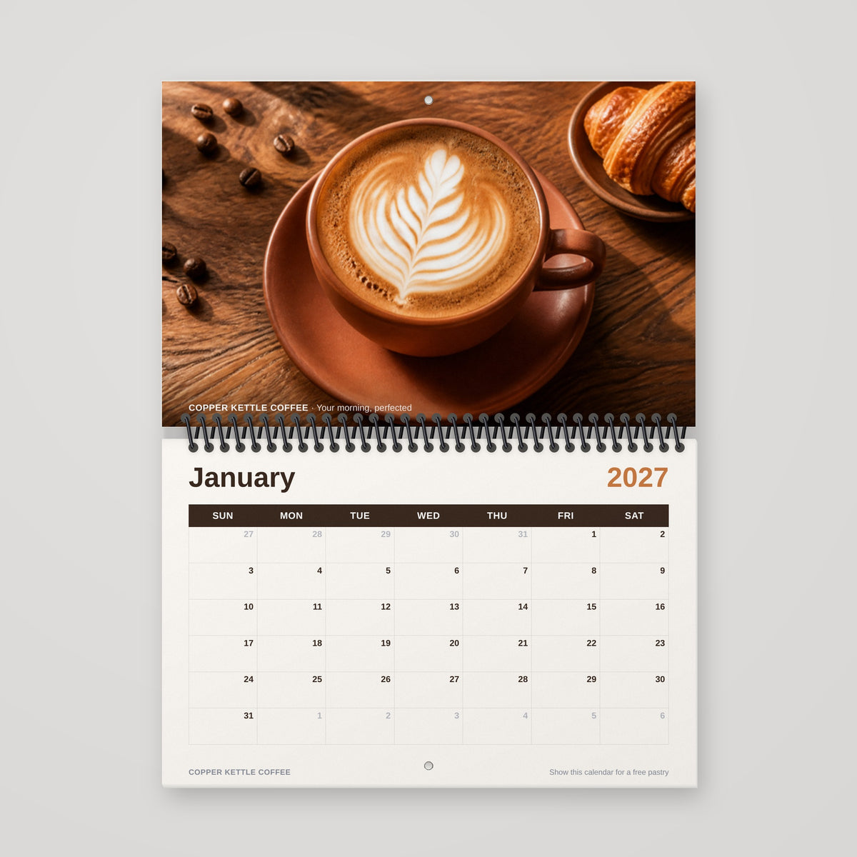 Custom 8.5 x 5.5 spiral wall calendar hanging open