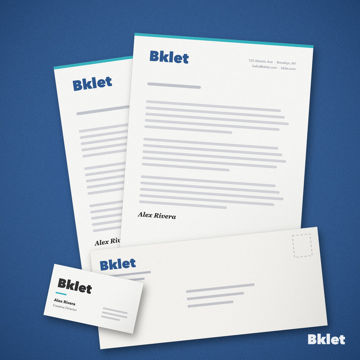 Custom letterhead with matching envelope and business card, printed by Bklet