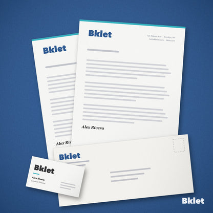 Custom letterhead with matching envelope and business card, printed by Bklet